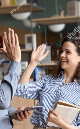 220927_stock-photo-two-happy-friendly-diverse-professionals-teacher-and-student-giving-high-five-standing-in-office-1937300755